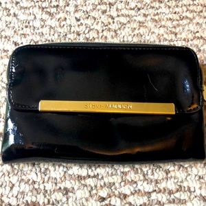 Beautiful zip around wallet with TONS of storage for cards, money and phone!